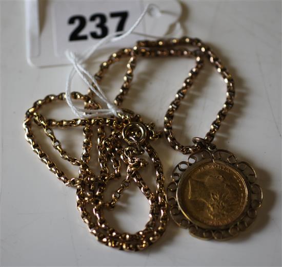 Gold mounted sovereign & gold chain